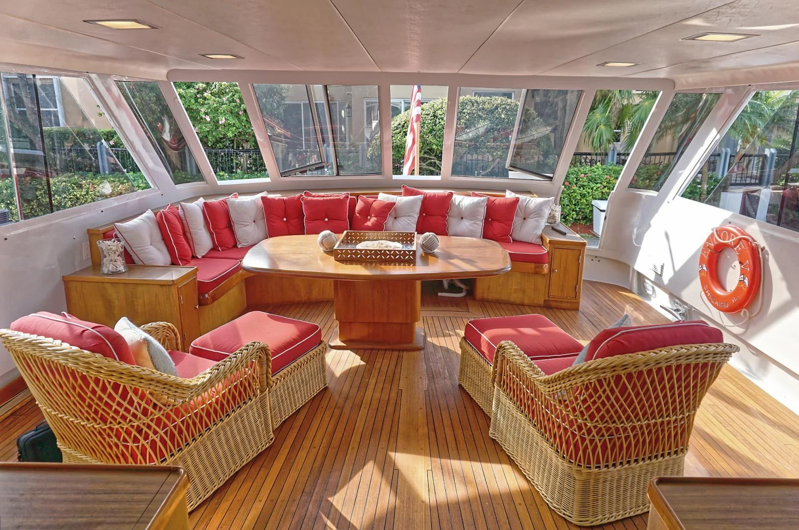 a living room with a couch and a table aboard ENCORE V Yacht for Sale