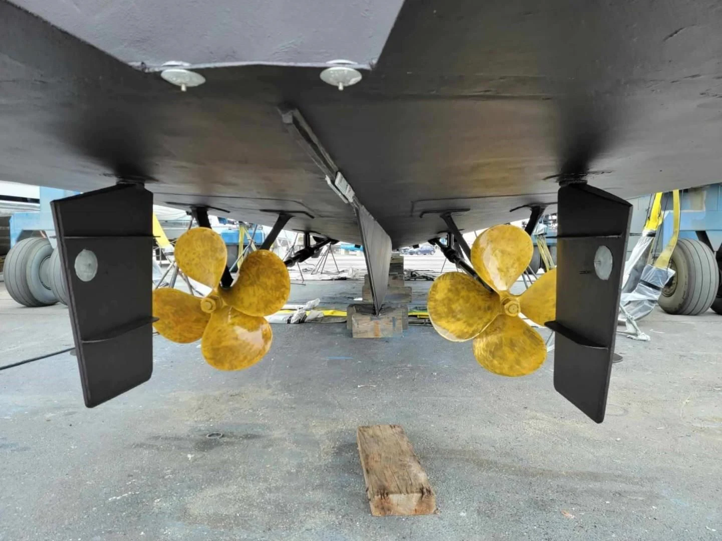 a large yellow object next to a large airplane aboard ENCORE V Yacht for Sale