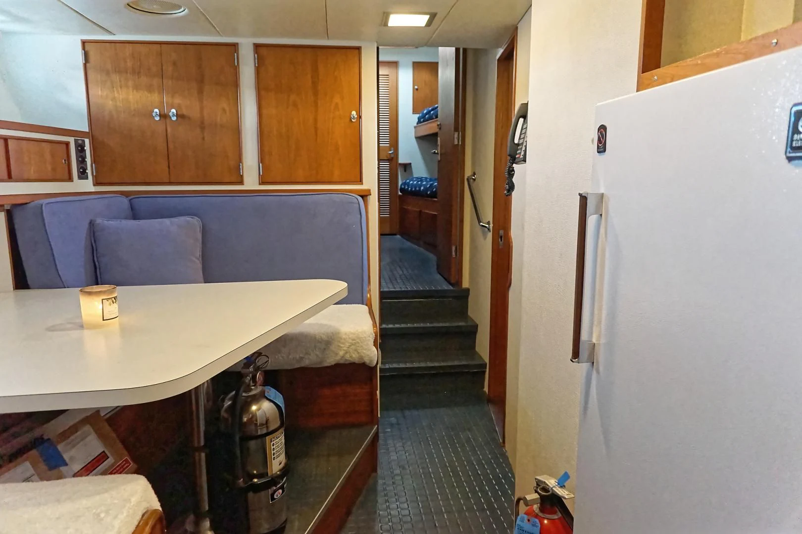 a kitchen and living room aboard ENCORE V Yacht for Sale