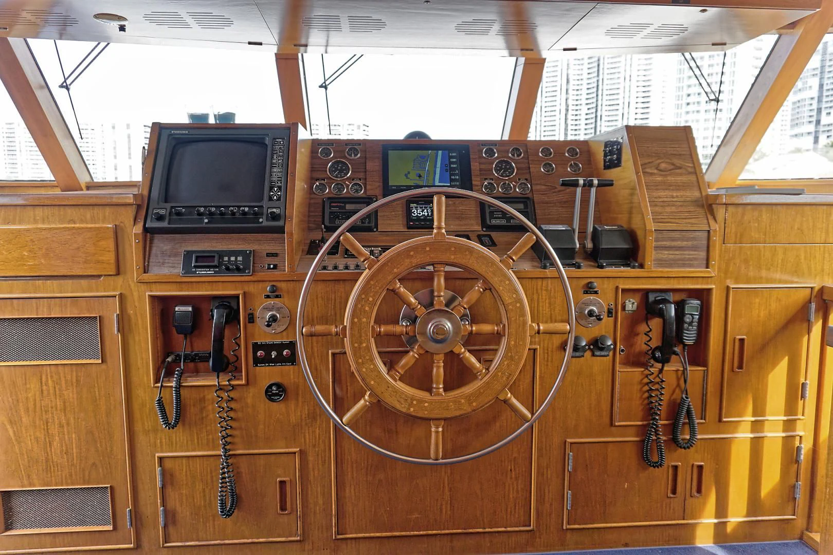 a room with a large fan and a tv aboard ENCORE V Yacht for Sale