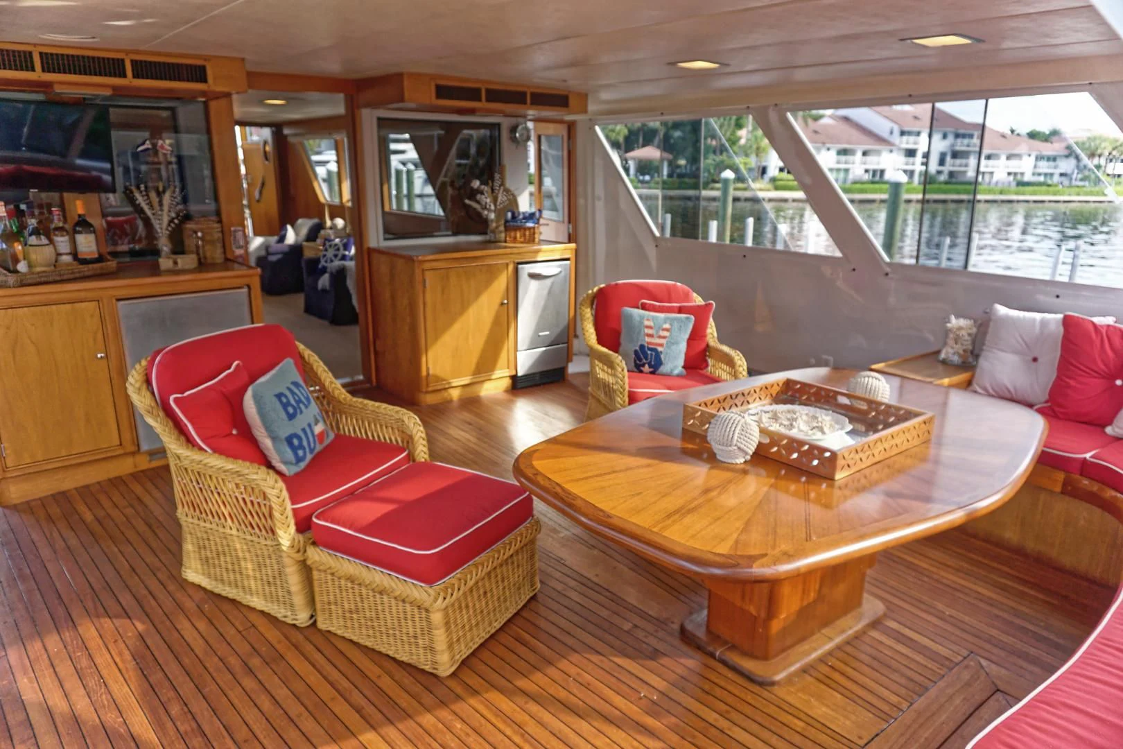 a living room with a couch and a tv aboard ENCORE V Yacht for Sale
