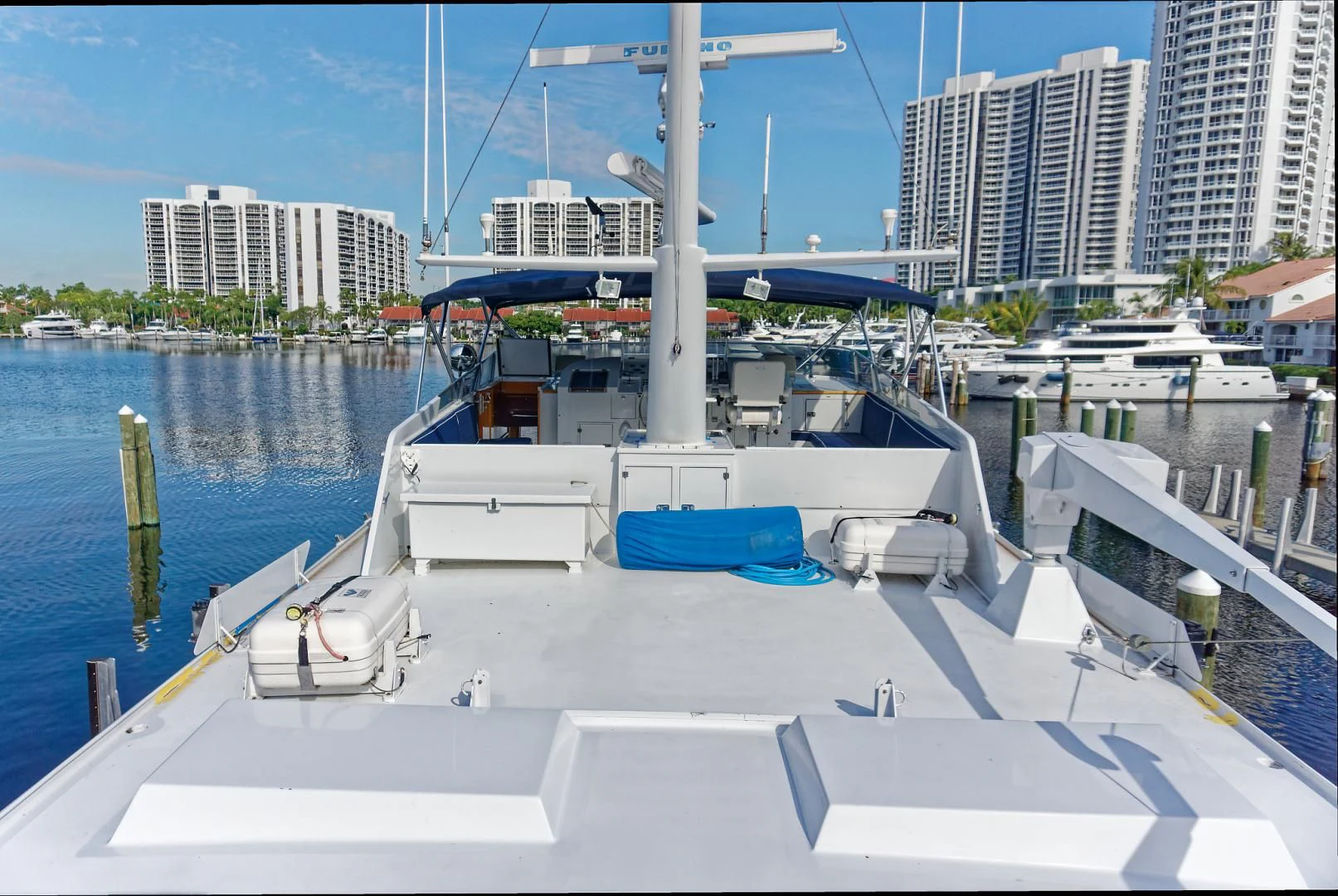 a boat in a harbor aboard ENCORE V Yacht for Sale