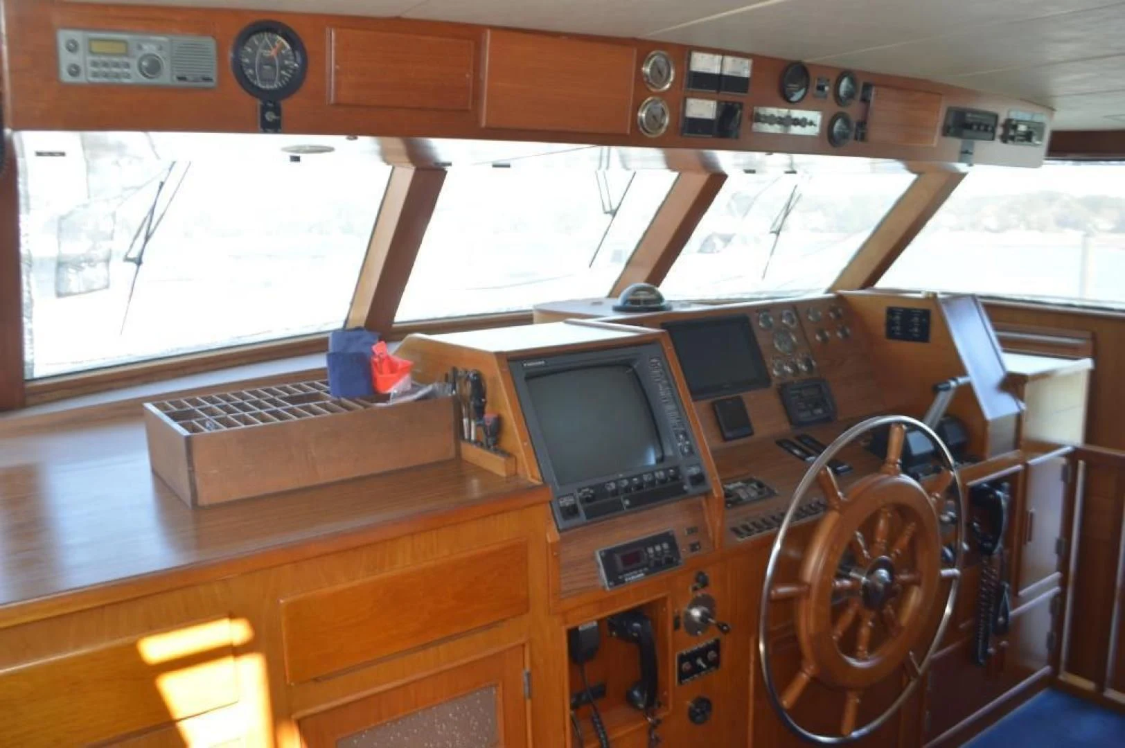 a control panel in a control room aboard ENCORE V Yacht for Sale