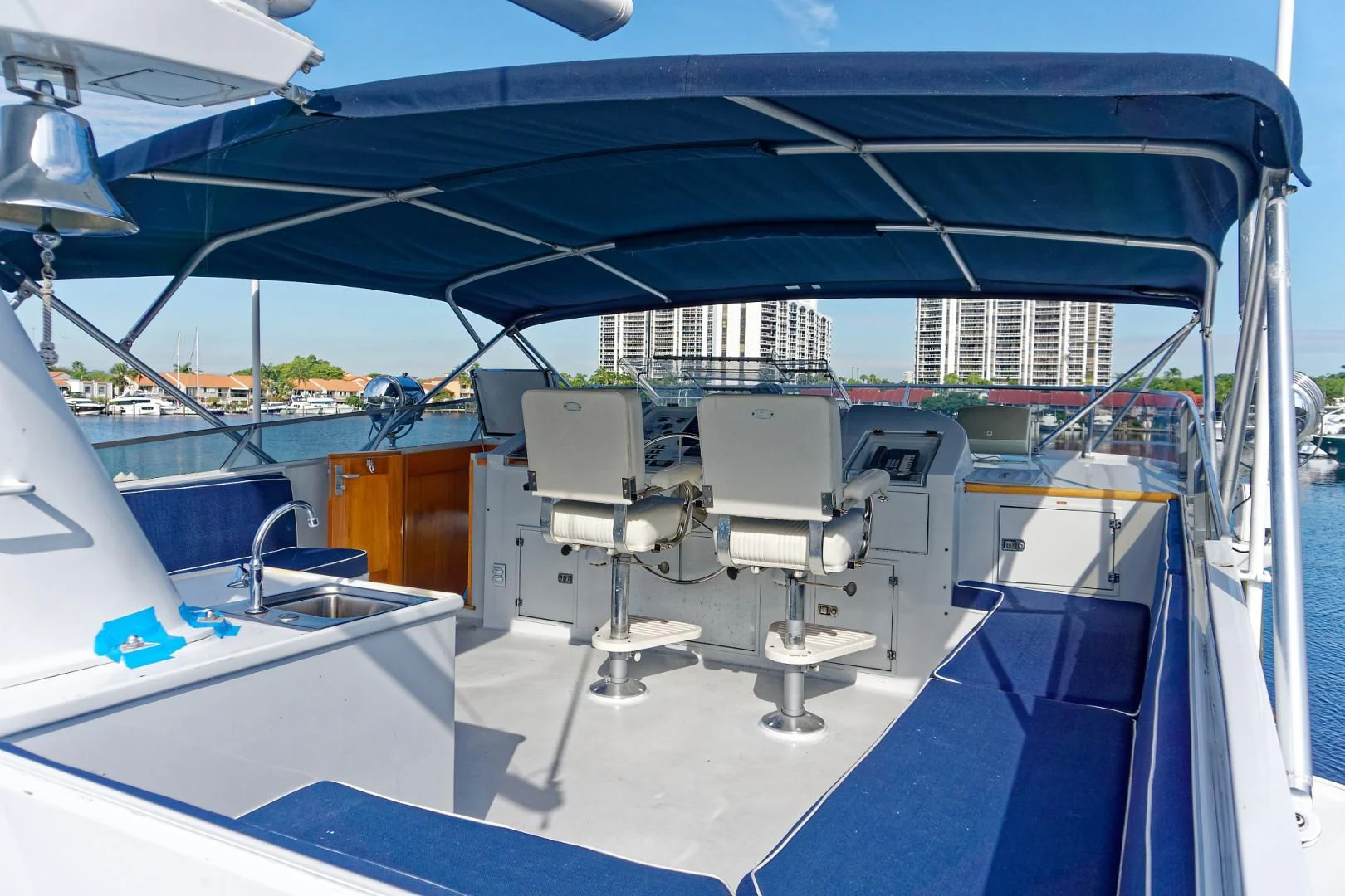 a boat with chairs on it aboard ENCORE V Yacht for Sale