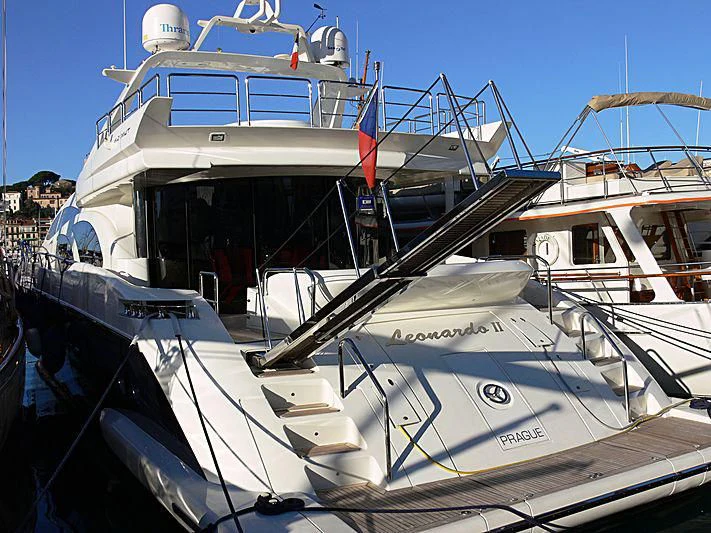 a boat docked at a pier aboard NICOLE Yacht for Sale