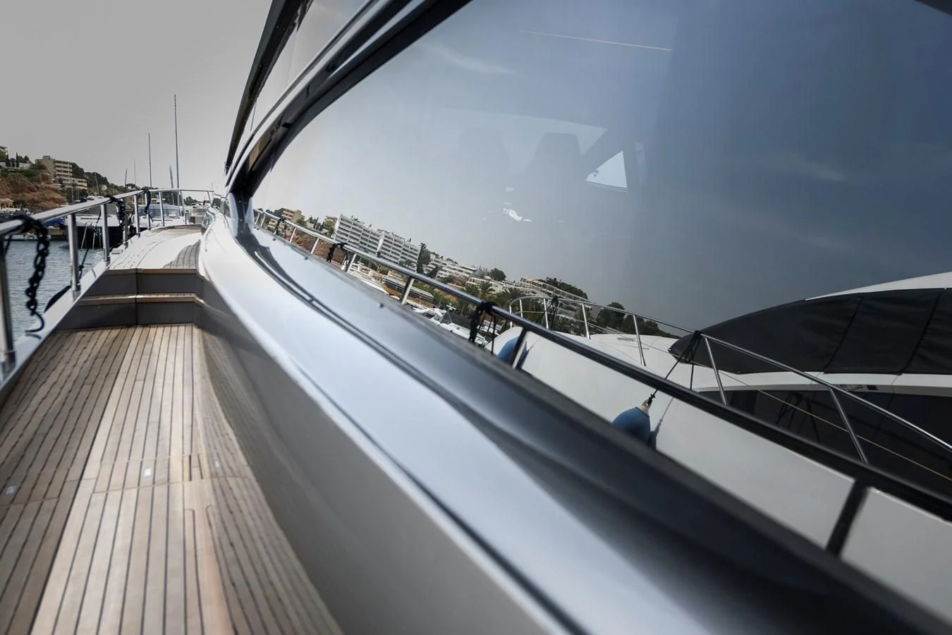 a deck with a large pool aboard CUCU Yacht for Sale