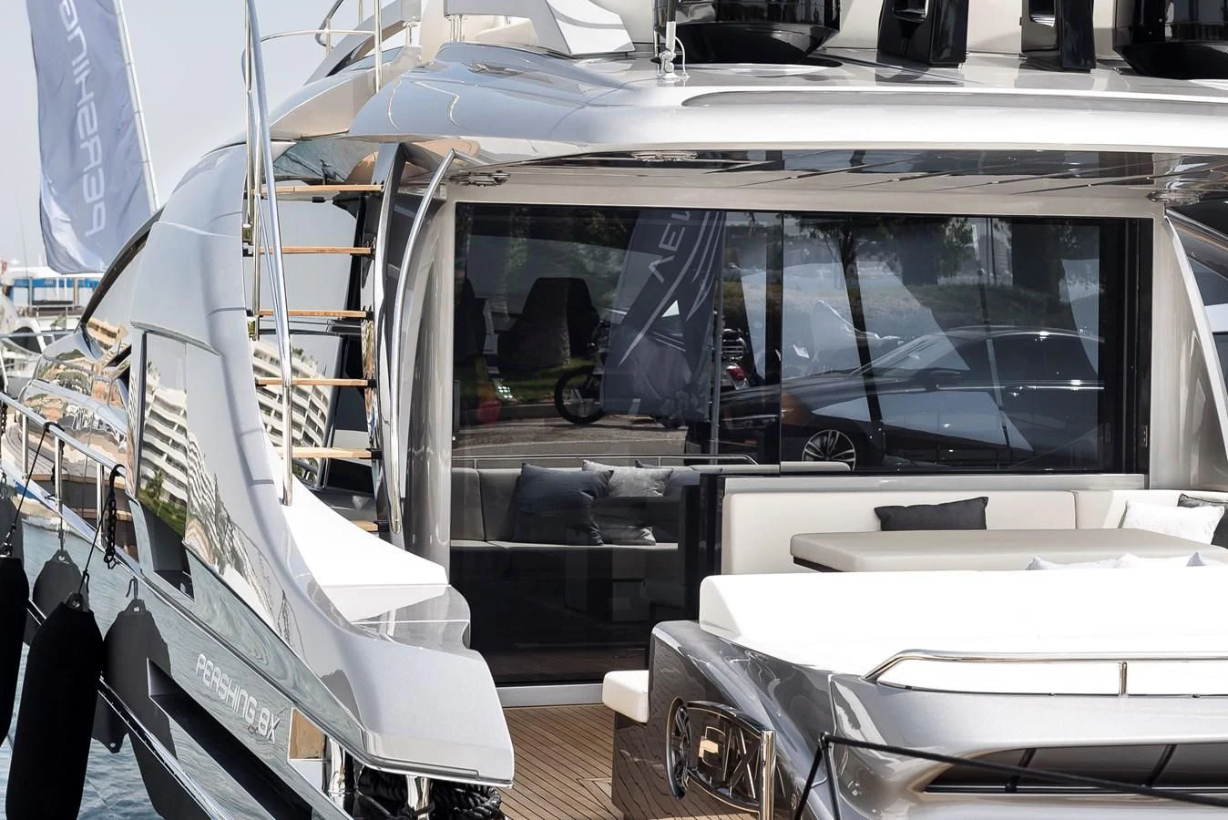 a large white boat with a ladder aboard CUCU Yacht for Sale