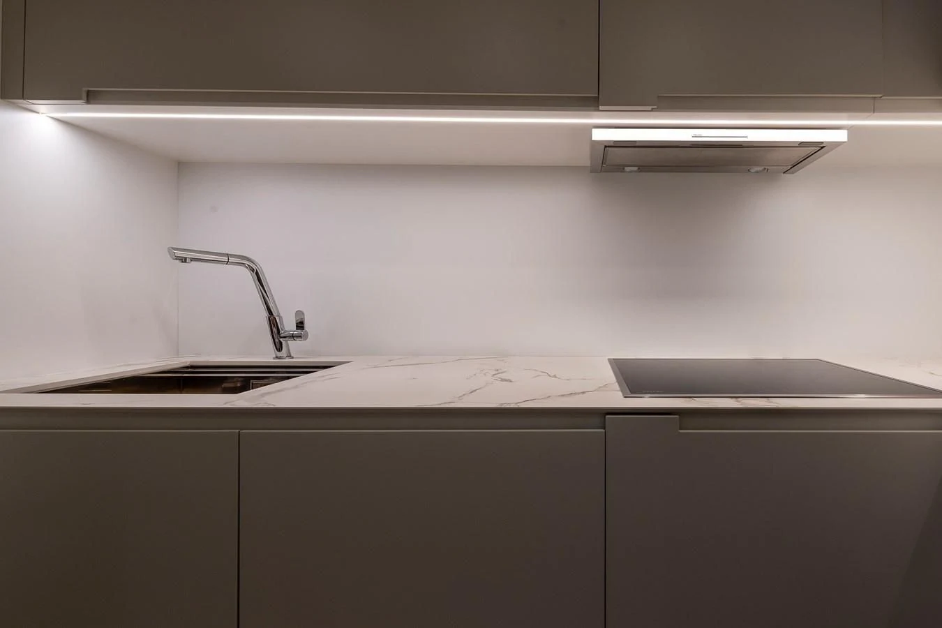 a kitchen with a sink and a faucet aboard CUCU Yacht for Sale