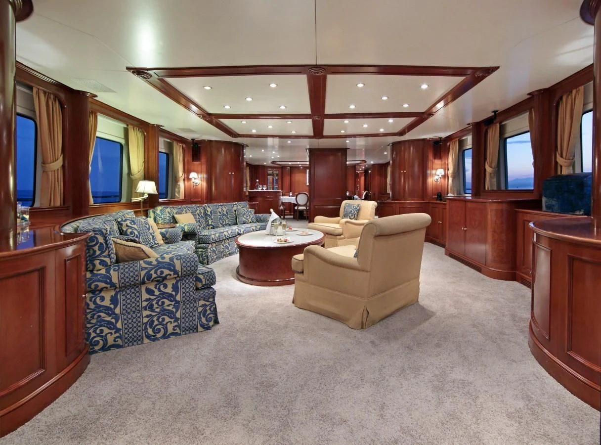 a living room with a large ceiling aboard INOUIS Yacht for Charter