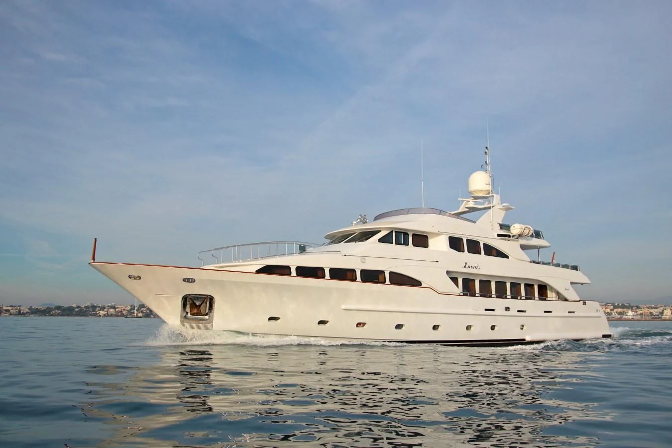a white yacht on the water aboard INOUIS Yacht for Charter