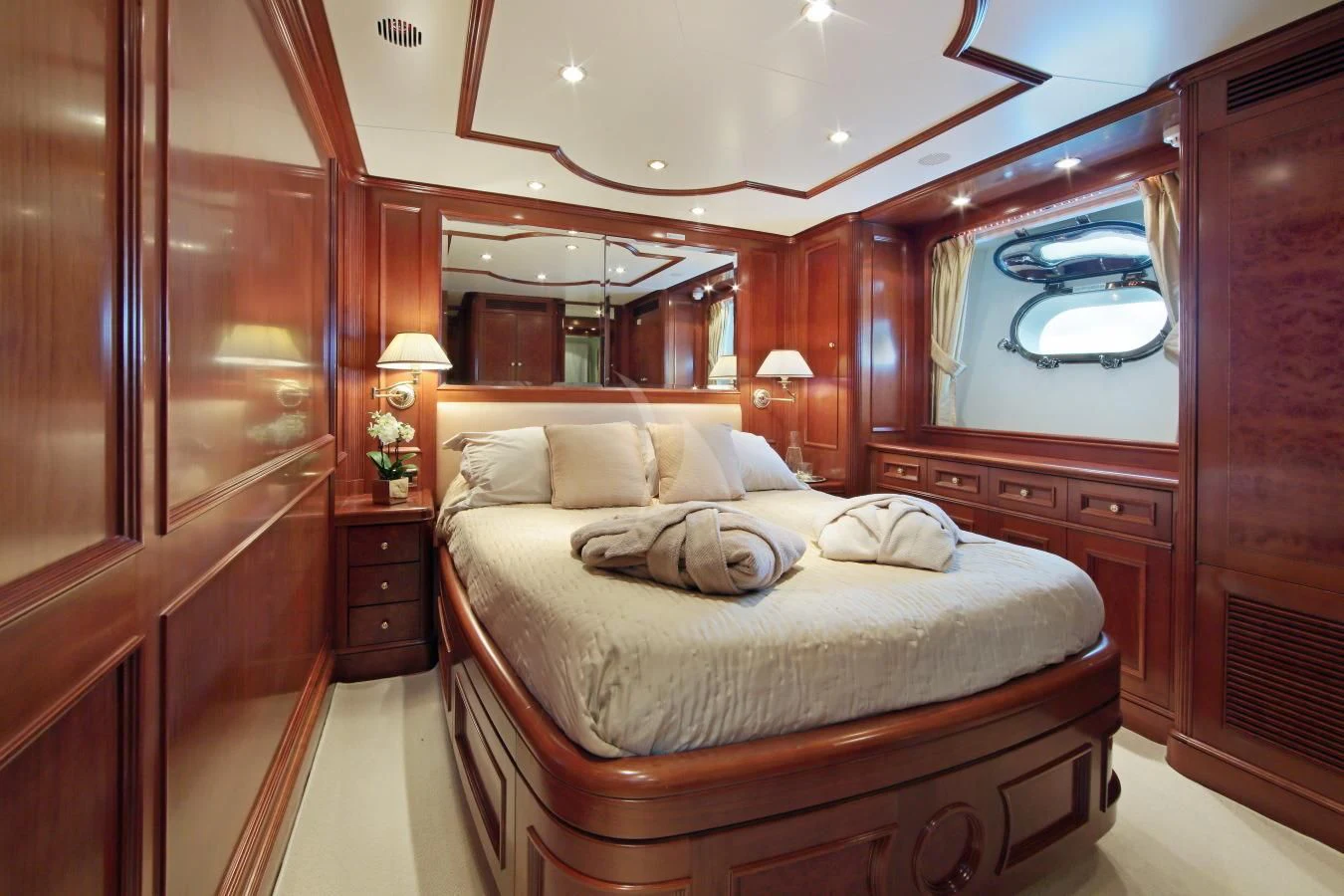 a bed in a room aboard INOUIS Yacht for Charter