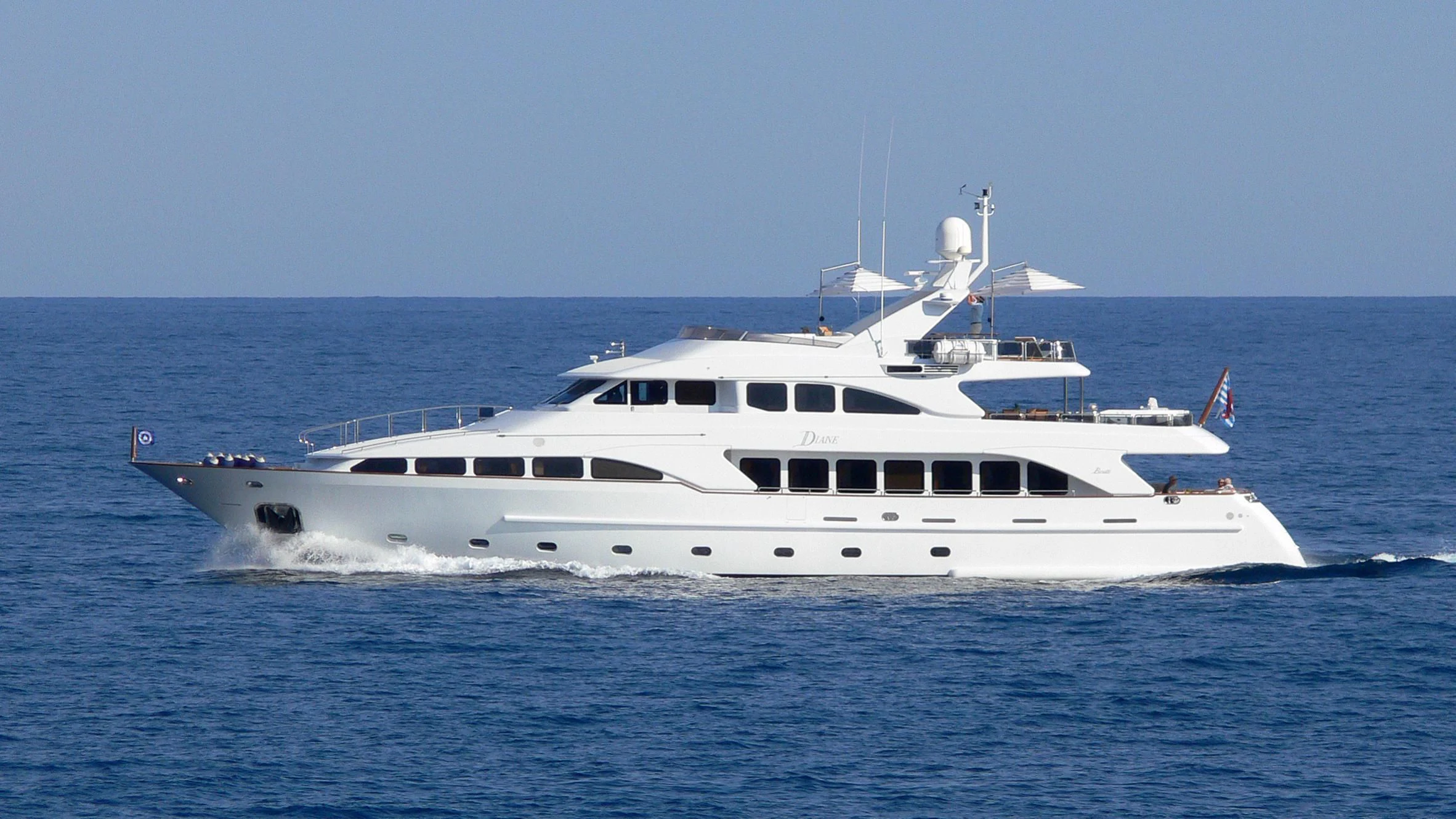 a white yacht in the water aboard INOUIS Yacht for Charter