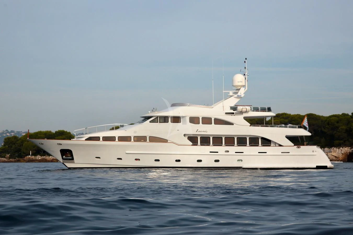 a white yacht on the water aboard INOUIS Yacht for Charter