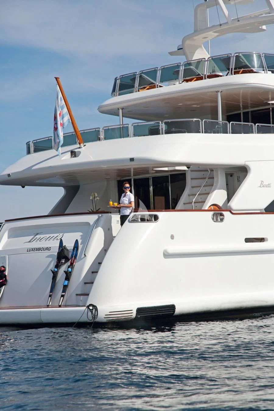 a person standing on a boat aboard INOUIS Yacht for Charter