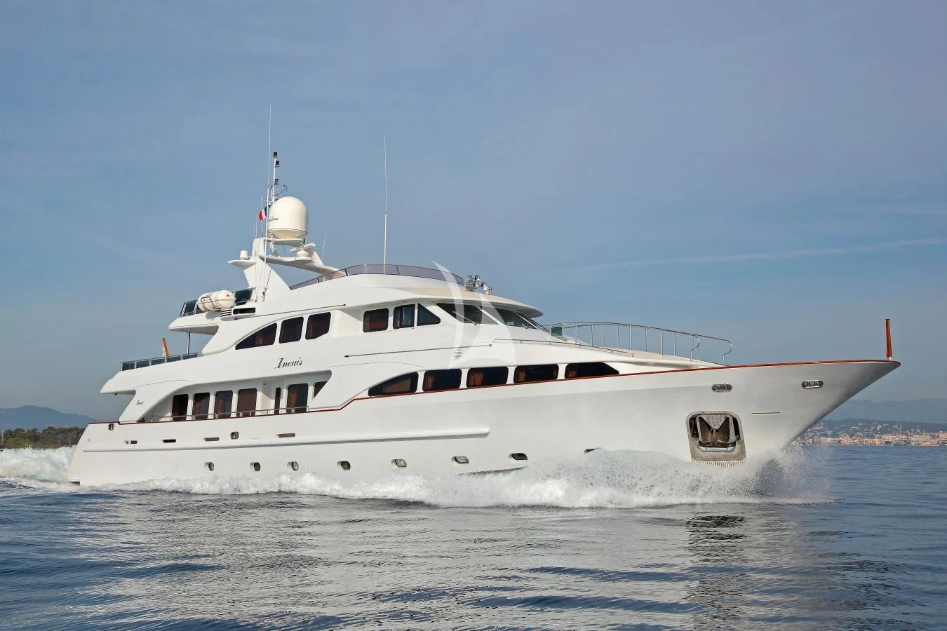 a white yacht on the water aboard INOUIS Yacht for Charter