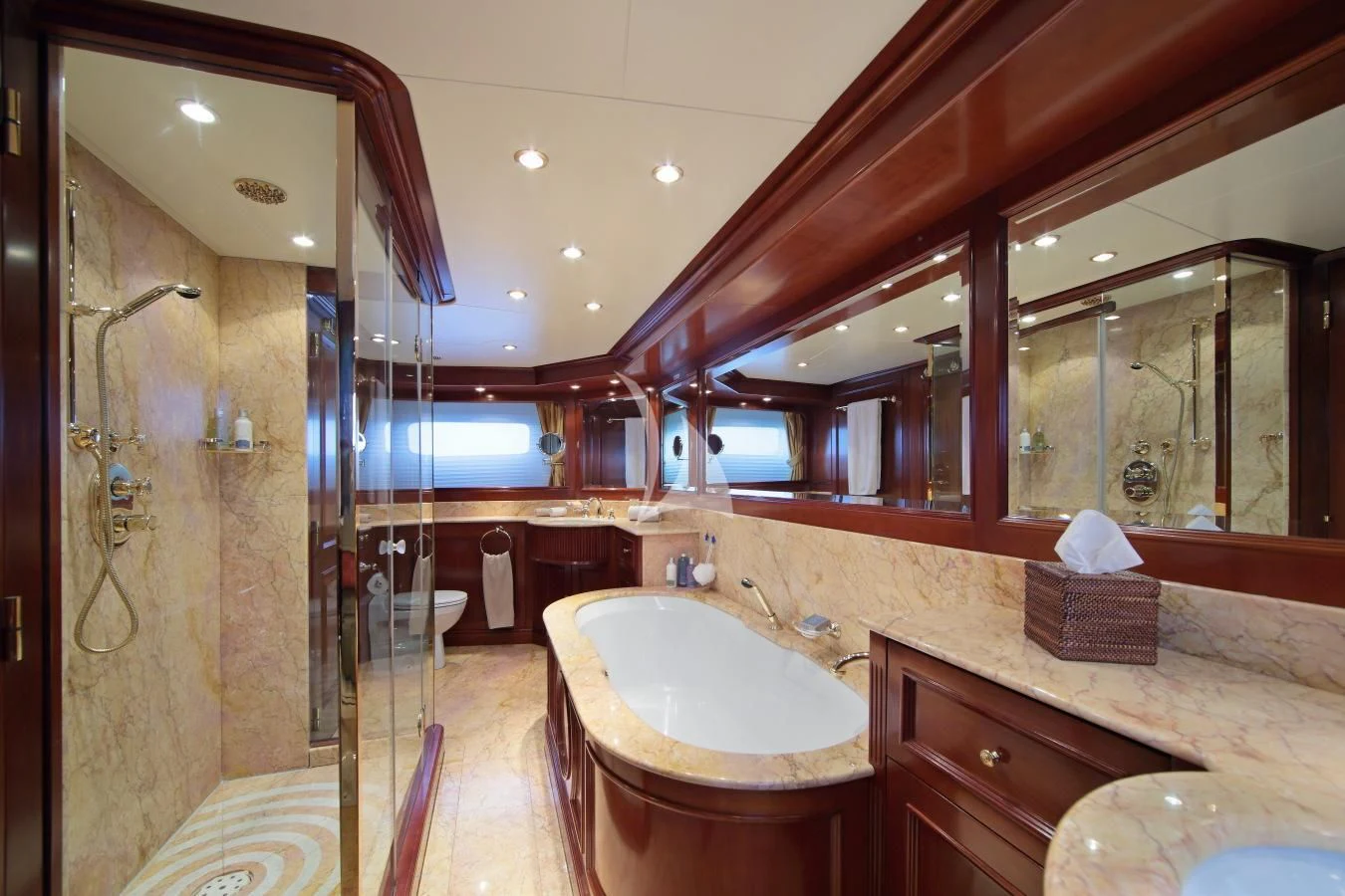a bathroom with a large mirror aboard INOUIS Yacht for Charter