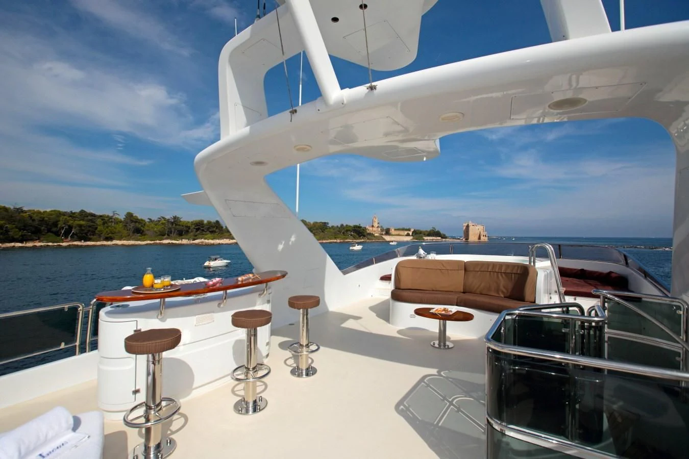 a large white airplane on a beach aboard INOUIS Yacht for Charter