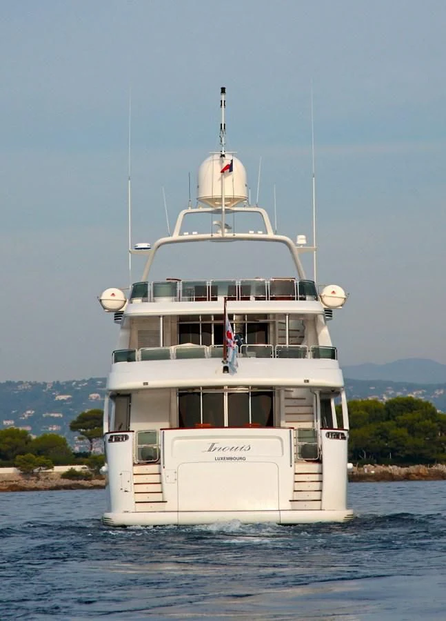 a white boat on the water aboard INOUIS Yacht for Charter