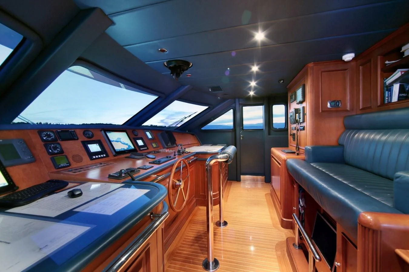 a room with a couch and a desk aboard INOUIS Yacht for Charter