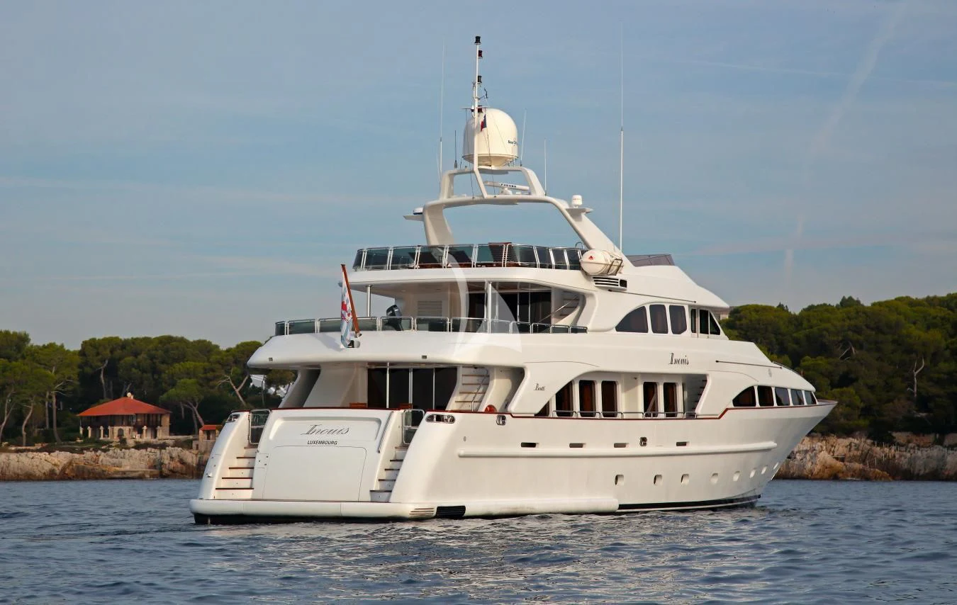 a large white boat on the water aboard INOUIS Yacht for Charter