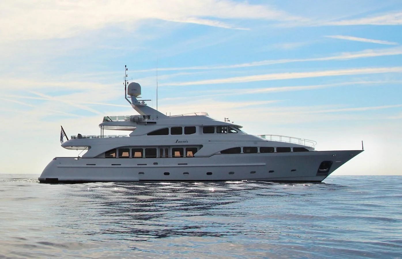 a large white yacht in the water aboard INOUIS Yacht for Charter
