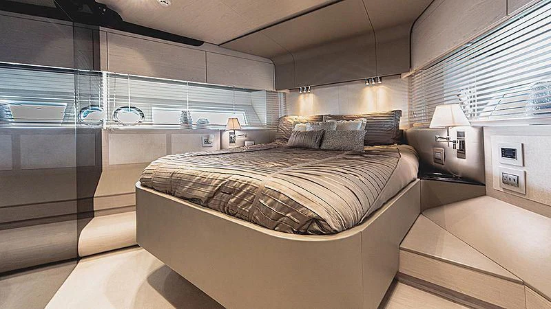 a bed in a room aboard TEMPTATION Yacht for Sale