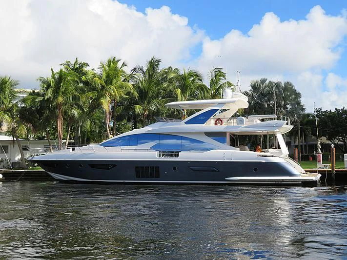 a boat docked at a pier aboard TEMPTATION Yacht for Sale