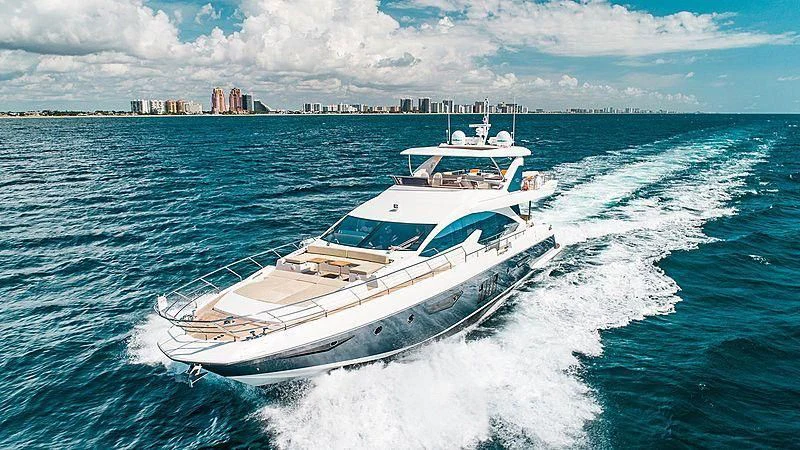 a boat on the water aboard TEMPTATION Yacht for Sale