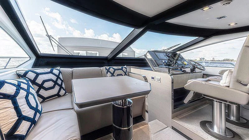 inside of a car aboard TEMPTATION Yacht for Sale