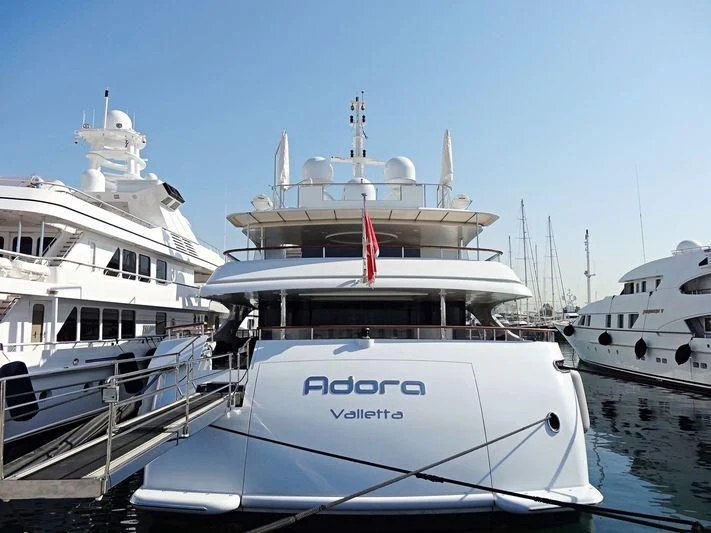 a group of boats in a harbor aboard ADORA Yacht for Sale