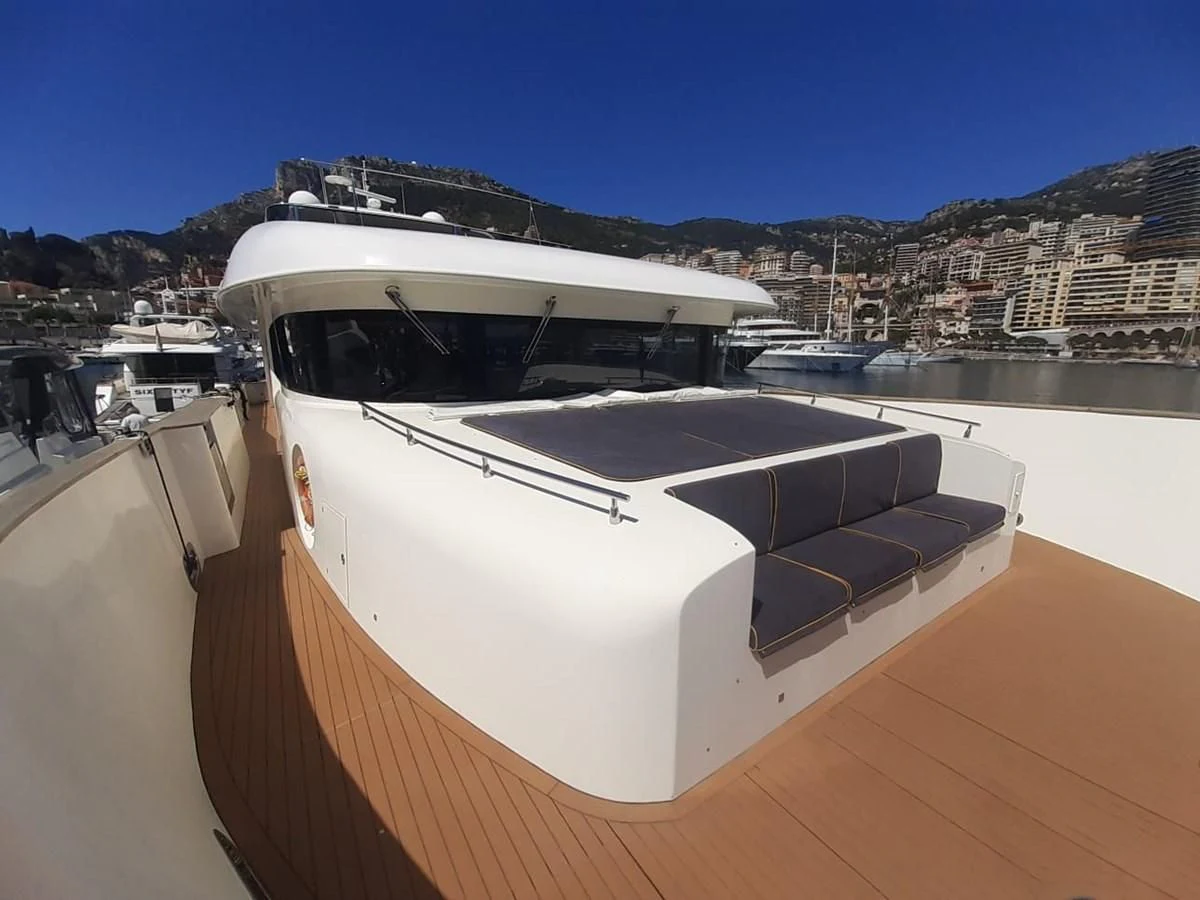a boat on a dock aboard MR GU Yacht for Sale