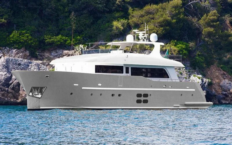 a white boat on water aboard MR GU Yacht for Sale