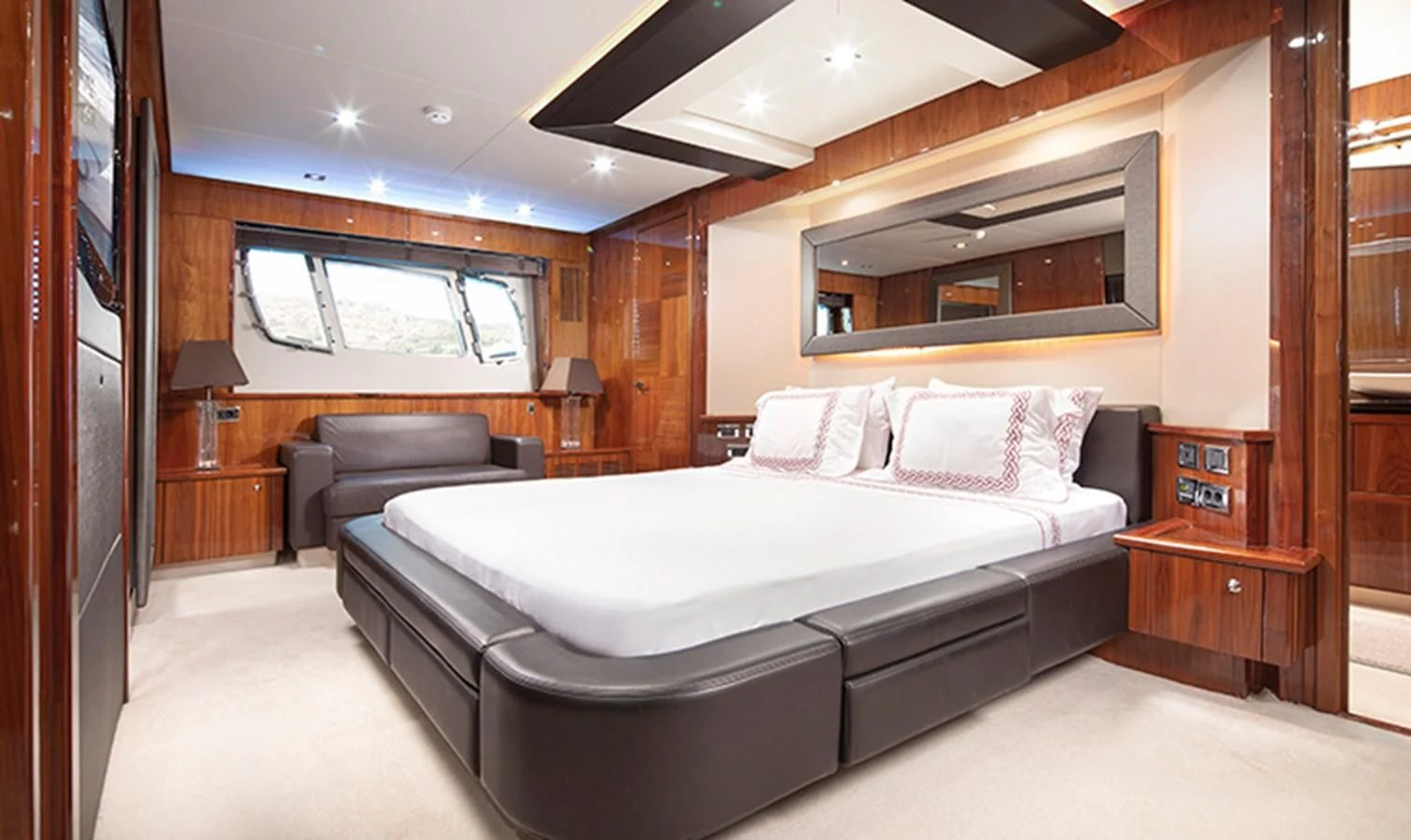 a bed in a room aboard SSM Yacht for Sale