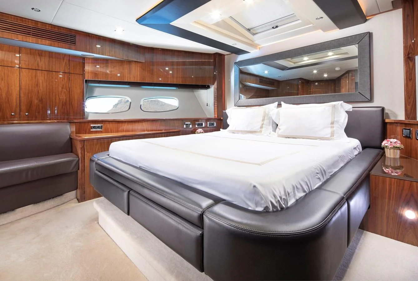 a bed in a room aboard SSM Yacht for Sale