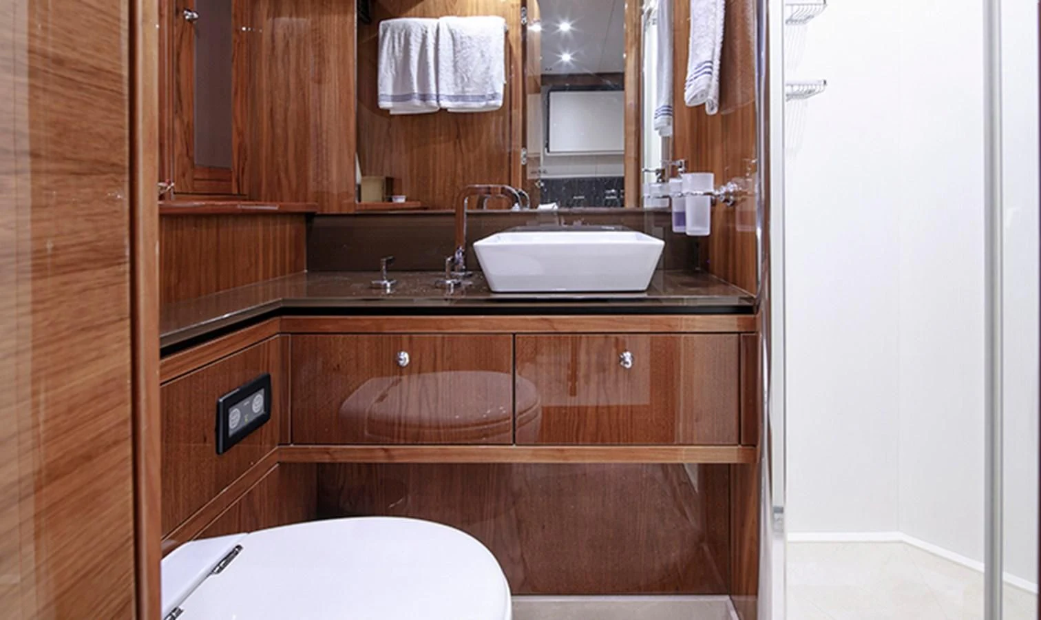 a bathroom with a sink and a toilet aboard SSM Yacht for Sale