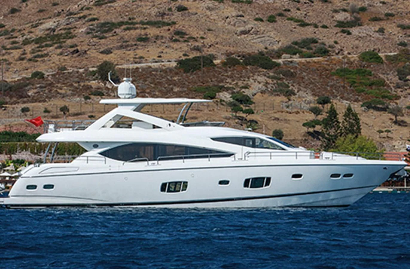 a white yacht in the water aboard SSM Yacht for Sale