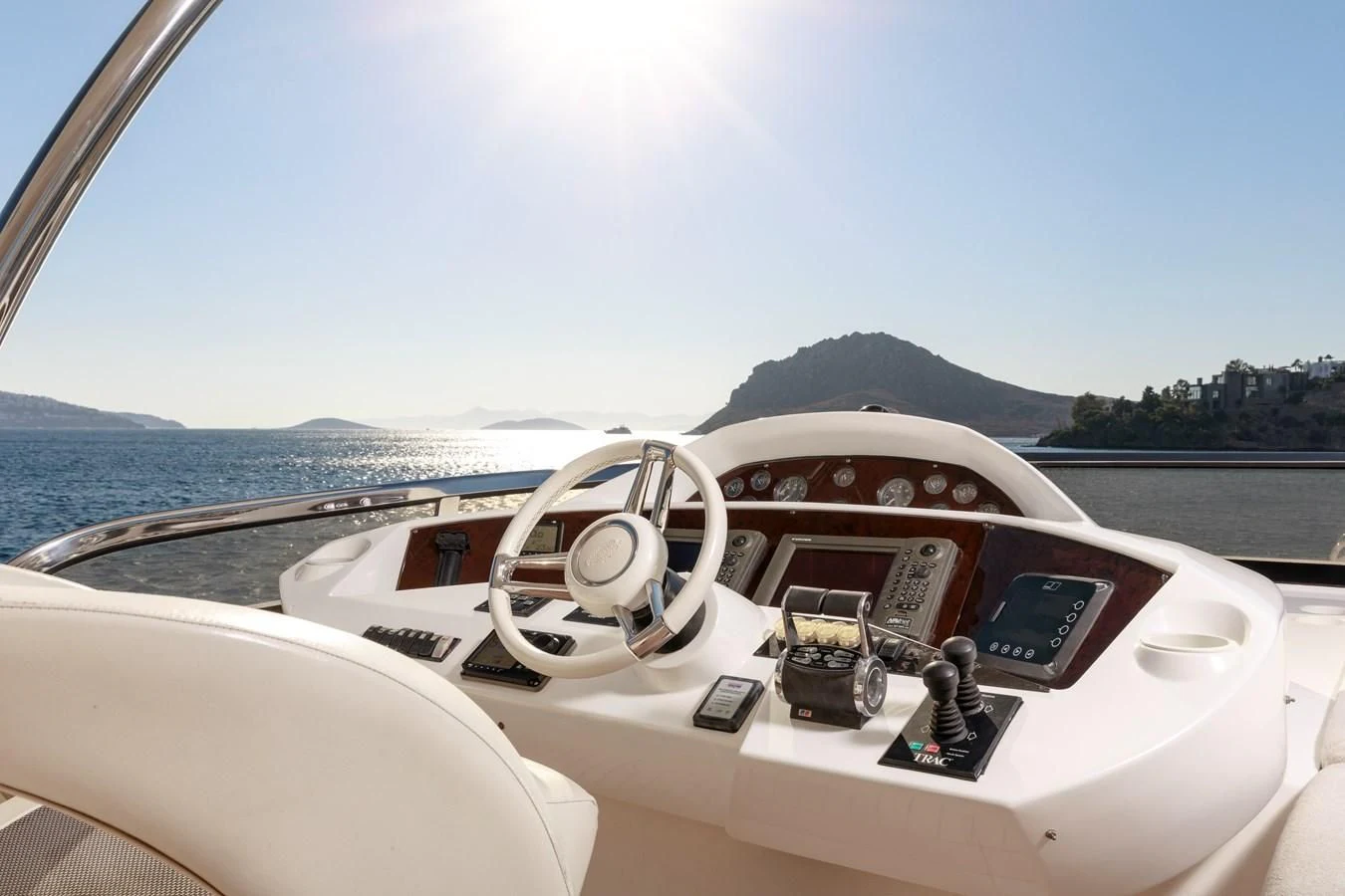 a person driving a boat aboard SSM Yacht for Sale