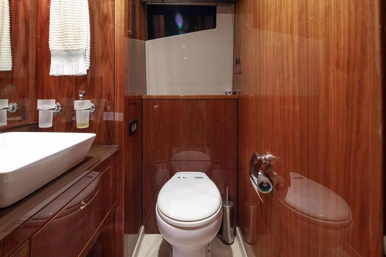 a bathroom with a toilet sink and a bathtub aboard SSM Yacht for Sale