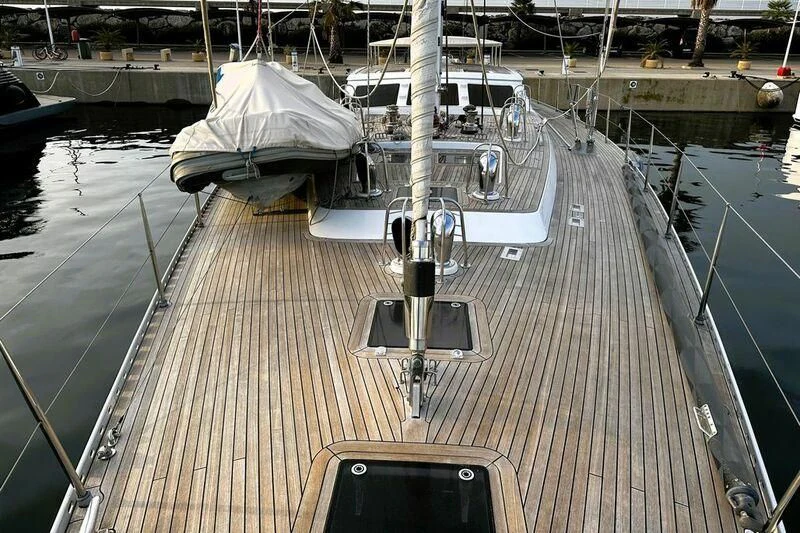 a deck with a boat on it aboard SONGBIRD OF LONDON Yacht for Sale