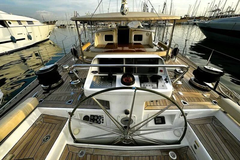 a boat in a harbor aboard SONGBIRD OF LONDON Yacht for Sale