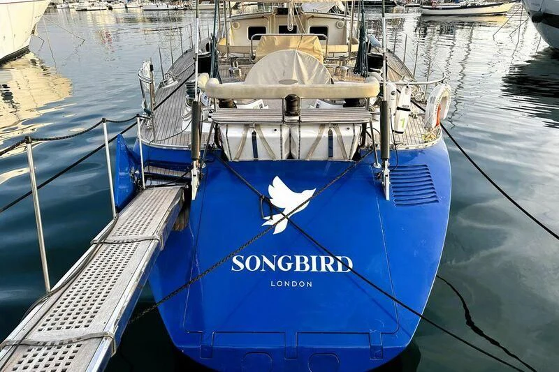 a boat with a bird on it aboard SONGBIRD OF LONDON Yacht for Sale