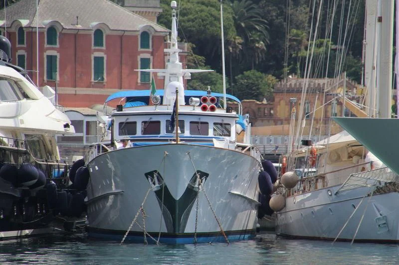 boats docked in a harbor aboard EUTOPIA Yacht for Sale