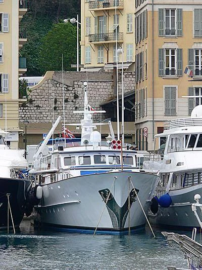 boats docked in a canal aboard EUTOPIA Yacht for Sale