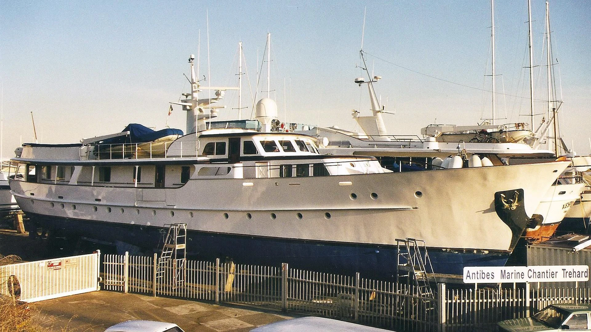 a large white boat aboard EUTOPIA Yacht for Sale