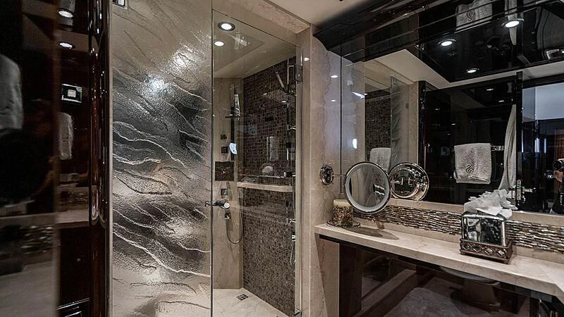 a large display case with a mirror aboard BLACK SWAN Yacht for Sale
