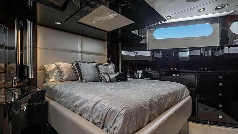 a bed in a room aboard BLACK SWAN Yacht for Sale