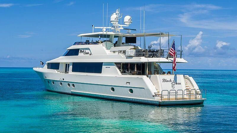 a boat in the water aboard BLACK SWAN Yacht for Sale