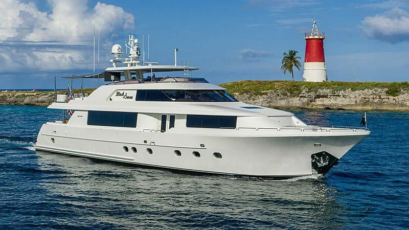 a boat in the water aboard BLACK SWAN Yacht for Sale