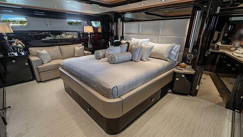 a large bed in a room aboard BLACK SWAN Yacht for Sale