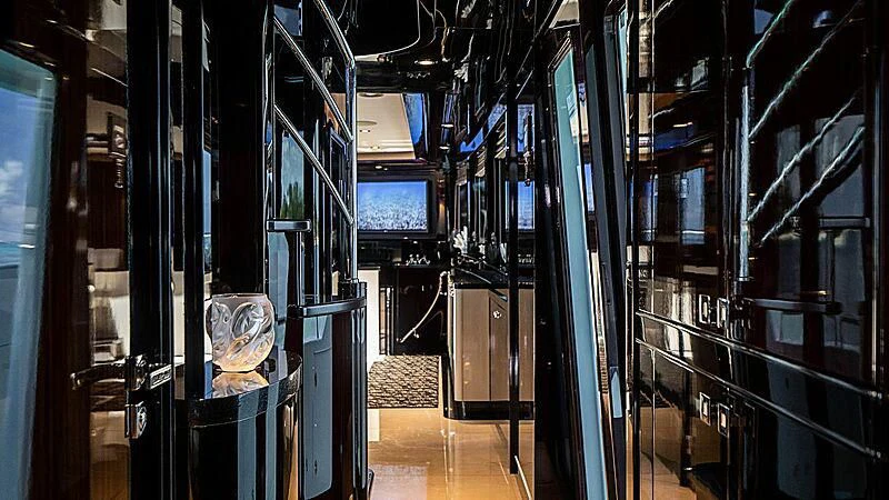 a room with computer screens aboard BLACK SWAN Yacht for Sale